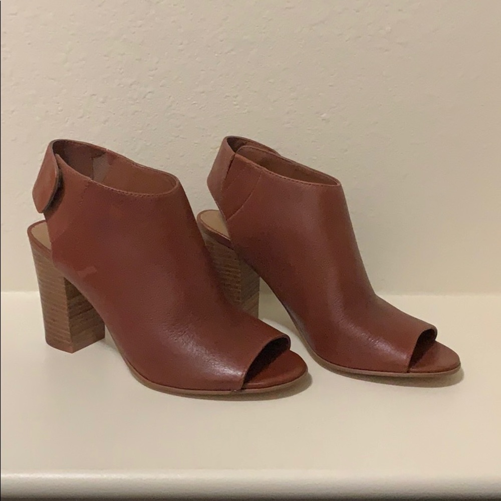 Women’s open toe heeled bootie. Size 7